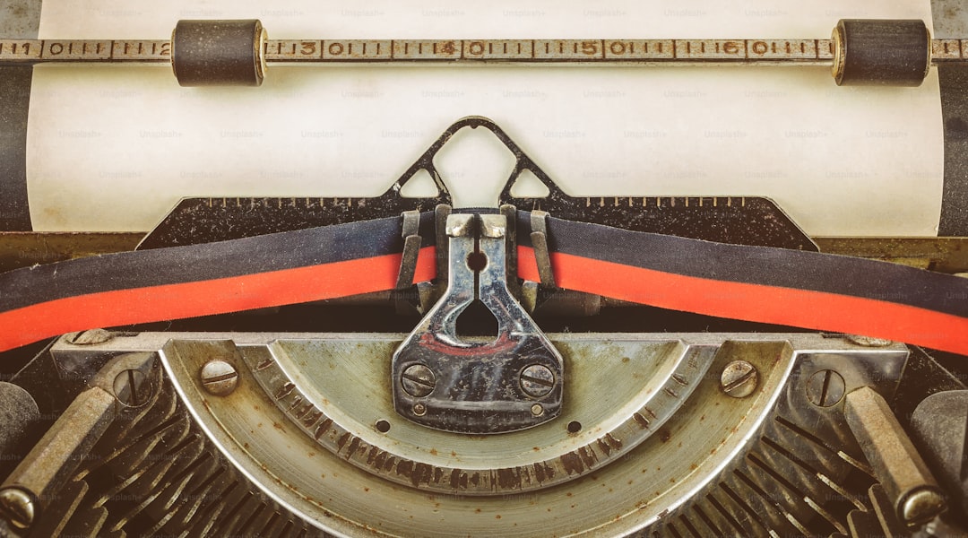 Vintage typewriter with blank paper